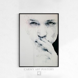 May include: Black framed art print with a pen and ink drawing of a person's face. The artwork is a close-up, with a finger touching the lips. The text "CARMY ART POSTERY" is printed at the bottom. The drawing is in shades of grey and black.