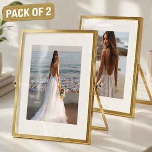 May include: A set of three ceramic mugs with a speckled, cream-colored glaze. Each mug features a different hand-painted floral design in shades of blue, green, and yellow. The mugs have a simple, rounded shape and a comfortable handle.