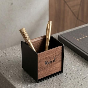 May include: A rustic wooden sign with the text "Welcome to our home" in white lettering. The sign features a distressed finish and a simple, inviting design, perfect for a front porch or entryway.