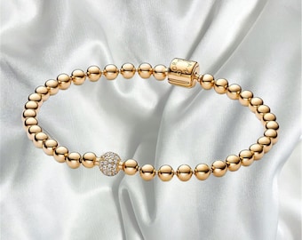 希少なティファニー 18Kゴールド＆シルバー フック＆アイ バングル