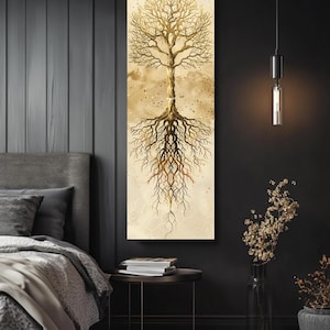 May include: A vertical canvas print depicting a gold tree with detailed branches and roots. The artwork has a neutral background with gold accents. The tree's symmetrical design adds a touch of elegance. Ideal for home decor.
