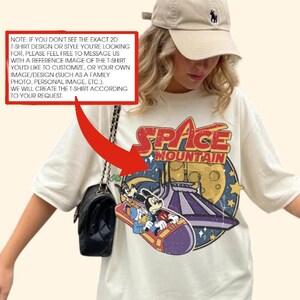 A woman wearing a white t-shirt with a space mountain graphic and a baseball cap, along with a text overlay that provides instructions for customizing a t-shirt.