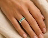 Emerald Spinner Ring — photo 9