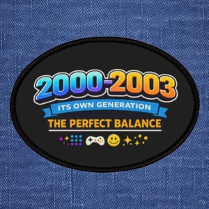 May include: Black oval patch featuring the text "2000-2003" in blue and orange, with "ITS OWN GENERATION" and "THE PERFECT BALANCE" below. Includes a controller, smiley face, and stars.