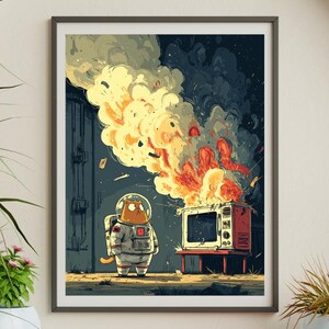 May include: Framed art print featuring an astronaut cat observing a burning television. The artwork has a cartoon style with a color palette of red, yellow, and blue. The cat is wearing a spacesuit. The background shows a dark, industrial setting.