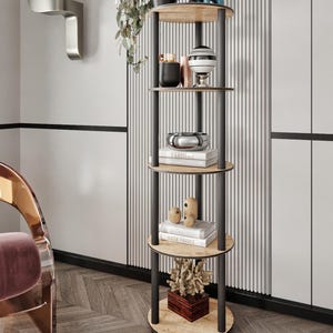 May include: A contemporary, multi-level shelving unit with black supports and light wood shelves. The shelves display decorative items including a blue elephant figurine, potted plants, books, and vases. The unit is in a well-lit room with a patterned rug.