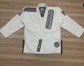 Shoyoroll Lotto n. 37: Uniforme da grappling Human Chess bianca da jiu jitsu con borsa