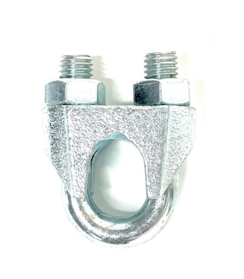 May include: A silver metal cable clamp with two threaded ends. The clamp is designed to secure cables and wires.