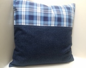 May include: A blue and white plaid pillow with a denim bottom. The pillow is made of soft, comfortable fabric and is perfect for adding a touch of style to any room.