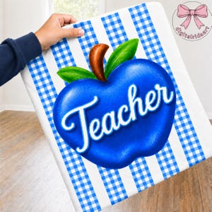 May include: A white fabric surface featuring a blue and white gingham pattern with a large, central blue apple graphic. The apple has a brown stem, two green leaves, and the word Teacher written in white cursive script across its centre.