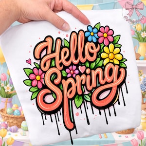 May include: White square pillow with the words "Hello Spring" in orange script, surrounded by colorful flowers and green leaves. The design includes black drips at the bottom, and small pink hearts.