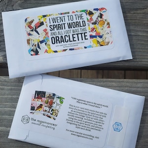 May include: Two white envelopes with stickers. The top envelope reads "I WENT TO THE SPIRIT WORLD AND ALL I GOT WAS THIS ORACLETTE." The bottom envelope has text and a collage-style image. The text describes a 10-card mini oracle.