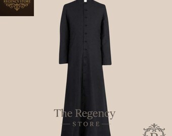 May include: A black clergy cassock with a mandarin collar and button-down front. The long-sleeved robe is displayed on a mannequin. The Regency Store logo is visible in the image.