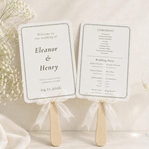 May include: Two rectangular wedding program fans with rounded corners and scalloped black borders. The left fan displays "Welcome to our wedding of Eleanor & Henry" with date "04.11.2026". The right fan lists the ceremony order and wedding party.