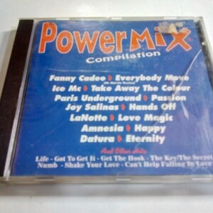 Può includere: Un CD di compilation musicale Power Mix in una custodia di plastica trasparente. La copertina blu presenta un testo arancione nella parte superiore e una tracklist che include artisti come Fanny Cadeo, Ice Mc, Paris Underground, Joy Salinas, LaNotte, Amnesia e Datura.