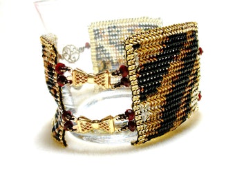 Animal Print Bracelet -Beadwoven in Gold, Black, and Red with Crystals, Filigree Connecters,and Bow Clasps