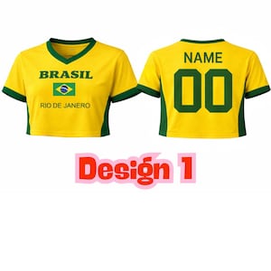 May include: A yellow crop top with green trim, featuring the word "BRASIL" above a Brazilian flag and "RIO DE JANEIRO." The back of the shirt has the word "NAME" above the number "00."