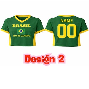 May include: A green and yellow crop top with the word "BRASIL" and the Brazilian flag on the front. The text "RIO DE JANEIRO" is below. The back of the shirt has the word "NAME" and the number "00" in yellow.
