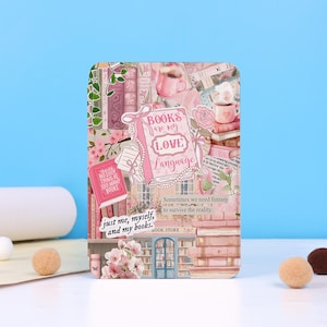 May include: A pink and white collage with book and floral imagery. The text "BOOKS are my LOVE Language" is central. Other text includes "just me, myself, and my books" and "NO SUCH THING AS TOO MANY BOOKS". The overall theme is books.