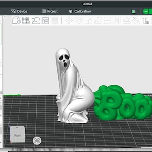 May include: A 3D digital model displayed on a computer screen showing a white ghost figure in a crouching position with a green cloud shape next to it that features the word Boo in a bubble letter style, set against a dark grid background.