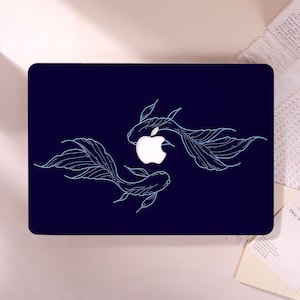 May include: A dark navy blue laptop skin featuring a white line art illustration of two koi fish swimming in a circular motion around the central white Apple logo. The fish are depicted with flowing fins and detailed scales in a light blue outline.