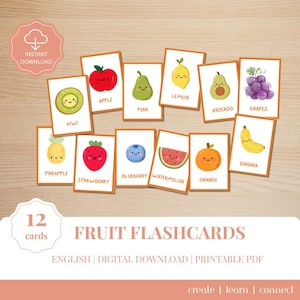 May include: A set of 12 fruit flashcards with illustrations of kiwi, apple, pear, lemon, avocado, grapes, pineapple, strawberry, blueberry, watermelon, orange, and banana. The cards have an orange border and the text "FRUIT FLASHCARDS".