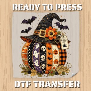May include: A DTF transfer sheet featuring a pumpkin wearing a black witch hat with an orange flower. The pumpkin has vertical panels with ghosts, skulls, bats, and jack-o'-lanterns. A tag with a spider illustration hangs from the hat, and bats fly above.