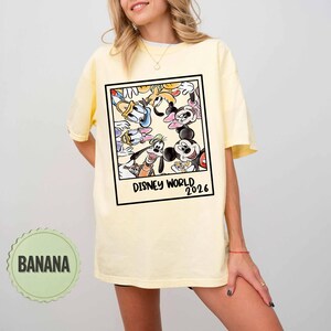 May include: A set of three ceramic mugs with a speckled, matte finish. The mugs are in cream, light grey, and dark grey. Each mug has a simple, minimalist design and a rounded handle.