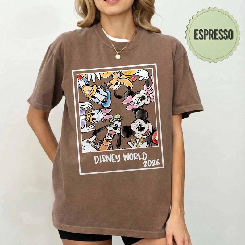 May include: A set of three ceramic mugs with a speckled, matte finish. The mugs are in cream, light grey, and dark grey. Each mug has a simple, minimalist design, ideal for coffee or tea.