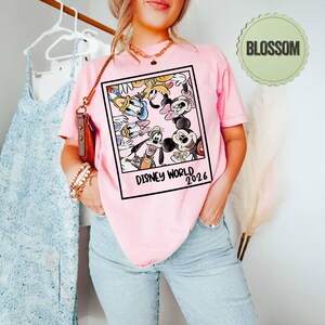 May include: A set of three ceramic mugs with a speckled, matte finish in cream, light grey, and dark grey. Each mug has a simple, minimalist design and a rounded handle.