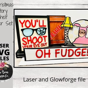 May include: A Christmas Story themed shelf sitter set with a red sign that says "YOU'LL SHOOT YOUR EYE OUT" and another sign that says "OH FUDGE!"  The set also includes a lamp, a box, and a character from the movie.
