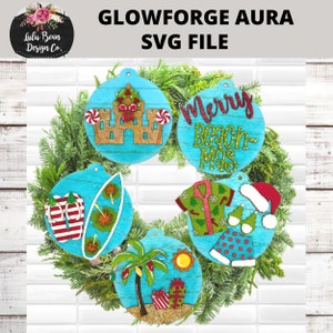 May include: Five round blue and white Christmas ornaments with a beach theme. The ornaments feature a sandcastle, a surfboard, a palm tree, a Hawaiian shirt, and a Santa hat. The ornaments are decorated with glitter and have a "Merry Beachmas" message.