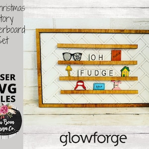 May include: A wooden letterboard set with three shelves, featuring a Christmas Story theme. The shelves are decorated with various characters and objects from the film, including glasses, a lamp, a house, a pig, a red hat, and a bar of soap. The letterboard is made of white tiles with black letters and the words "OH" and "FUDGE" are spelled out on the shelves. The letterboard is framed in a brown wooden frame.