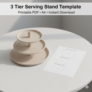 May include: A beige 3-tier serving stand template with a printable PDF. The stand has three circular tiers and a central support column. A paper with circular templates is next to the stand. The text on the image says "3 Tier Serving Stand Template".