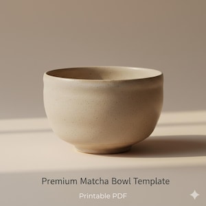 May include: A beige ceramic matcha bowl with a speckled texture. The bowl has a wide, rounded shape and a slightly flared rim. The text "Premium Matcha Bowl Template" and "Printable PDF" are at the bottom.