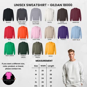 May include: A display of Gildan 18000 unisex sweatshirts in various colors, including black, red, and gold. The image also shows a size chart with measurements in inches. The text "UNISEX SWEATSHIRT - GILDAN 18000" is at the top.