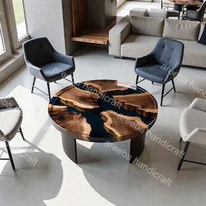 May include: A round coffee table with a dark blue resin center and natural wood edges. The table is surrounded by four armchairs with black metal legs. The room has a modern design with neutral colors and large windows.