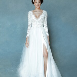 Wedding dress long sleeves lace and tulle skirt with a slit available. Feminine and comfortable image 1