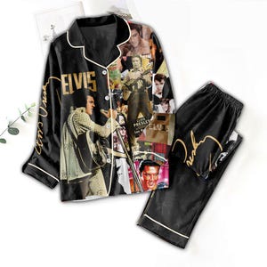 May include: Black pajama set with images of Elvis Presley. The top has a collared neckline, button closure, and white trim. The trousers have an elasticated waistband and white trim. The set is made of a silky material.