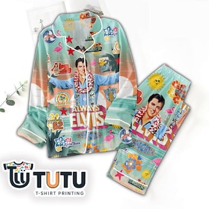 May include: A two-piece pajama set with a colourful print of Elvis Presley in a Hawaiian shirt, surrounded by tropical imagery. The set includes a button-down top and matching trousers, with the text "Always Elvis" displayed.