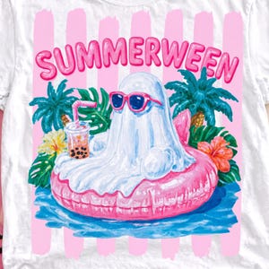 May include: White t-shirt with a graphic of a ghost wearing sunglasses and floating on a pink inner tube. The word "SUMMERWEEN" is in pink bubble letters above the ghost. The ghost is holding a drink with a straw.