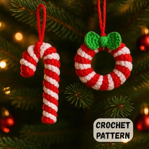 May include: Two handmade crochet Christmas ornaments: a candy cane and a wreath. The candy cane is red and white striped. The wreath is red and white striped with a green bow. The text "CROCHET PATTERN" is in a white box.