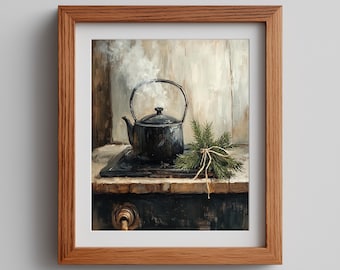 May include: A framed oil painting depicting a black metal kettle on a stove with steam rising from the top. A small bundle of green pine needles tied with twine rests beside the kettle. The artwork is encased in a light brown wooden frame.