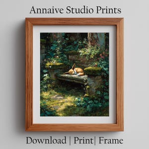 May include: A framed print featuring a serene forest scene with a sleeping fox-like creature on a stone bench. The artwork is surrounded by lush greenery and moss-covered stones. The text "Annaive Studio Prints" is at the top.