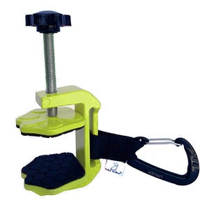 May include: A lime green clamp with a black handle and a black screw. The clamp has a black carabiner clip attached to a black strap. The clamp has a black rubber grip on the bottom and top.