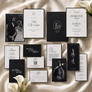 May include: A wedding stationery suite featuring black and white cards with elegant typography. The set includes a Save the Date with a photo, a formal invitation, RSVP cards with a QR code, a menu, and detail cards, all arranged in a cohesive layout.