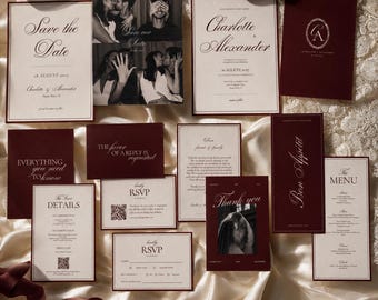 May include: A wedding stationery suite featuring cream and deep burgundy cards with elegant serif typography. The set includes Save the Date cards with black and white photos, RSVP cards with QR codes, a menu, and thank you cards, all arranged on a draped fabric.