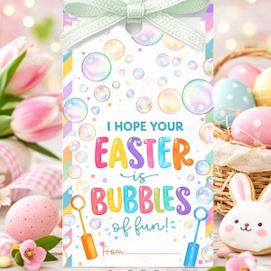May include: A colorful Easter gift tag with a light green bow at the top. The tag features the text "I hope your Easter is bubbles of fun!" with bubble graphics and two bubble wands. Easter-themed.