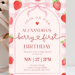 May include: A pink and white invitation with a strawberry theme. The text reads "Join us for Alexandra's berry first birthday." The date is November 27th at 2 PM. RSVP to Olivia.