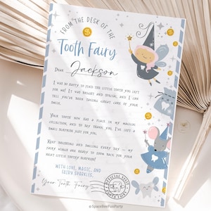 May include: A letter from the Tooth Fairy, addressed to Jackson, with illustrations of a fairy, a mouse, and a tooth bag. The letterhead includes the text "From the Desk of the Tooth Fairy". The letter is decorated with stars and gold coins.